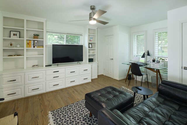 4232 Meadowdale Ln, Dallas, TX 75229 - living area featuring an office area, ceiling fan, and wood finished floors