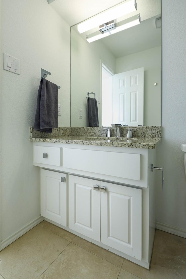 4232 Meadowdale Ln, Dallas, TX 75229 - bathroom with vanity and tile patterned floors