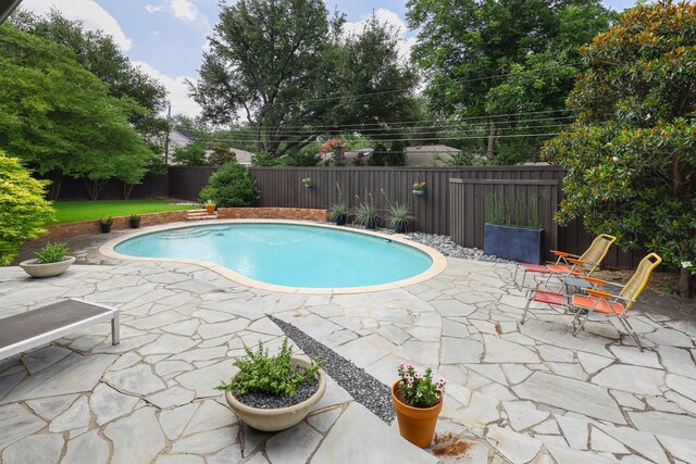 4232 Meadowdale Ln, Dallas, TX 75229 - view of swimming pool with a fenced backyard and a patio area