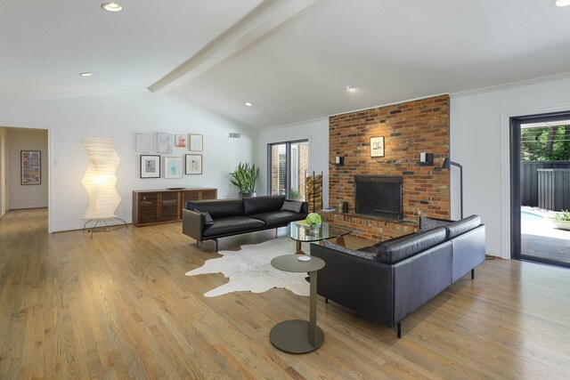 4232 Meadowdale Ln, Dallas, TX 75229 - living room with light wood finished floors and a fireplace