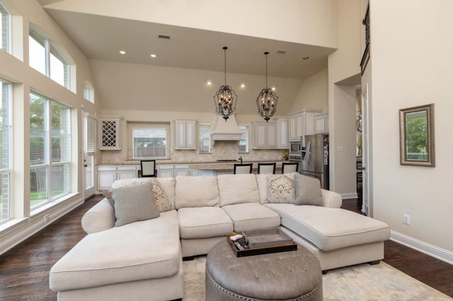6812 S Fork Dr, North Richland Hills, TX 76182 - living area featuring high vaulted ceiling, a chandelier, dark wood-style flooring, and recessed lighting