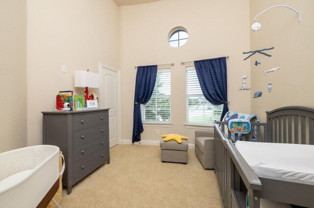 6812 S Fork Dr, North Richland Hills, TX 76182 - bedroom with light colored carpet and a towering ceiling