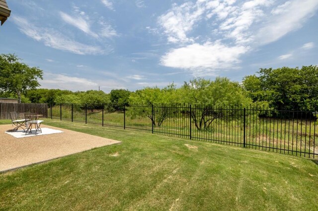 6812 S Fork Dr, North Richland Hills, TX 76182 - fenced yard with a patio area