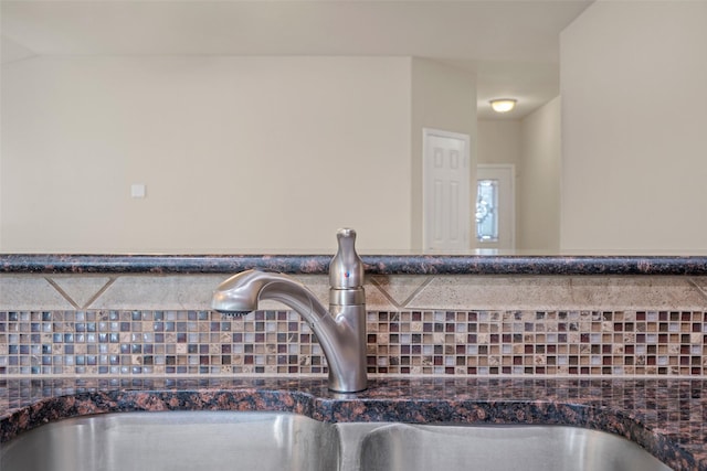 6521 La Sol Ln, Waco, TX 76712 - detailed view of a sink and decorative backsplash