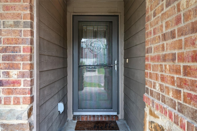 6521 La Sol Ln, Waco, TX 76712 - property entrance featuring brick siding