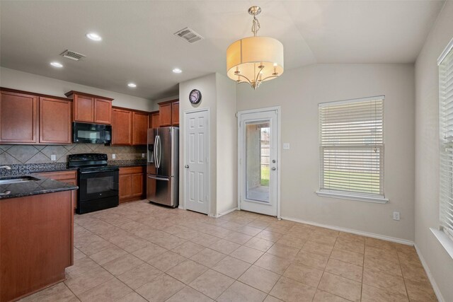 6521 La Sol Ln, Waco, TX 76712 - kitchen featuring black appliances, decorative backsplash, light tile patterned floors, lofted ceiling, and dark stone countertops