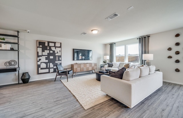 7518 Fenton Pkwy, Pilot Point, TX 76258 - living area with wood finished floors