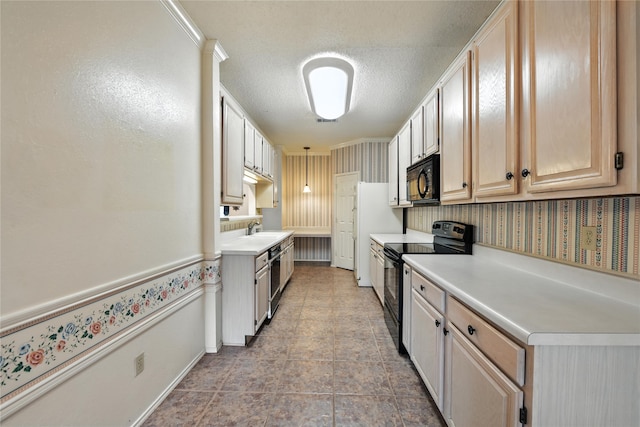 2116 S Winding Creek Dr, Grapevine, TX 76051 - kitchen with black appliances, light countertops, and a textured ceiling