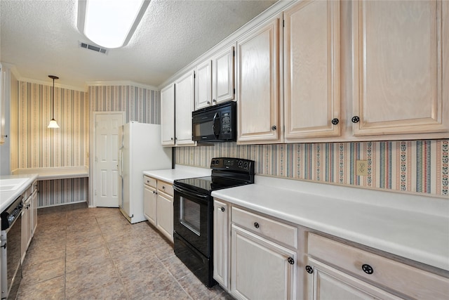 2116 S Winding Creek Dr, Grapevine, TX 76051 - kitchen featuring black appliances, wallpapered walls, light countertops, a textured ceiling, and hanging light fixtures