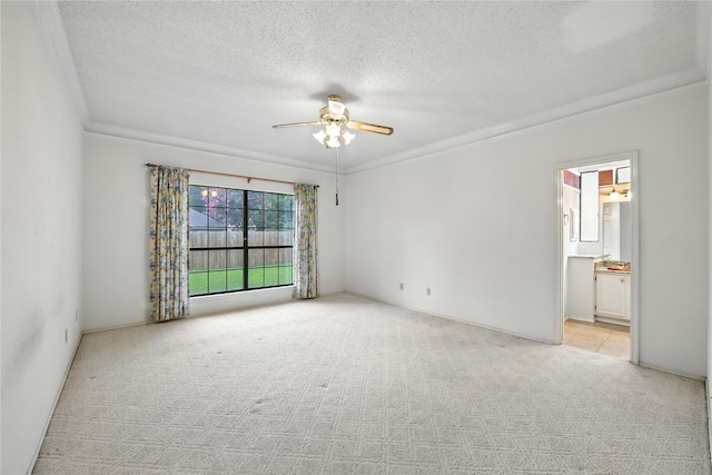 2116 S Winding Creek Dr, Grapevine, TX 76051 - unfurnished room featuring ornamental molding, light colored carpet, ceiling fan, and a textured ceiling