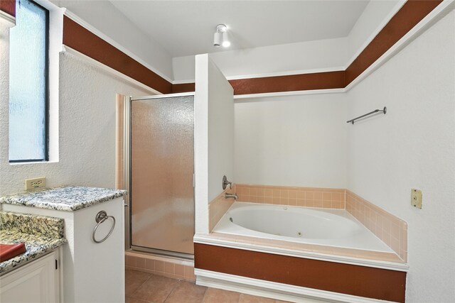 2116 S Winding Creek Dr, Grapevine, TX 76051 - full bathroom featuring a stall shower, a tub with jets, vanity, tile patterned floors, and healthy amount of natural light