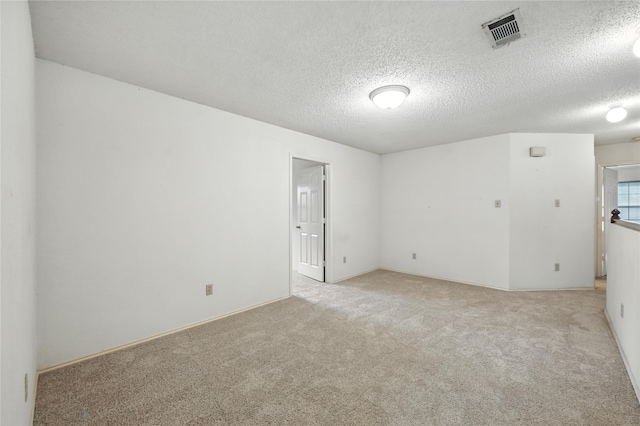 2116 S Winding Creek Dr, Grapevine, TX 76051 - spare room with light carpet and a textured ceiling