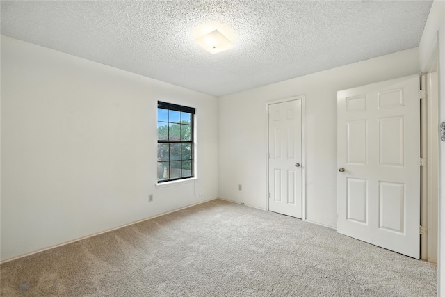 2116 S Winding Creek Dr, Grapevine, TX 76051 - unfurnished bedroom with carpet, a textured ceiling, and a closet