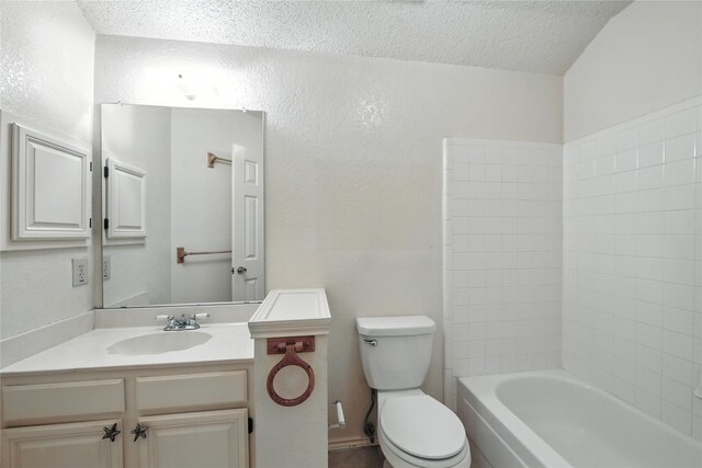2116 S Winding Creek Dr, Grapevine, TX 76051 - bathroom with a textured ceiling and vanity