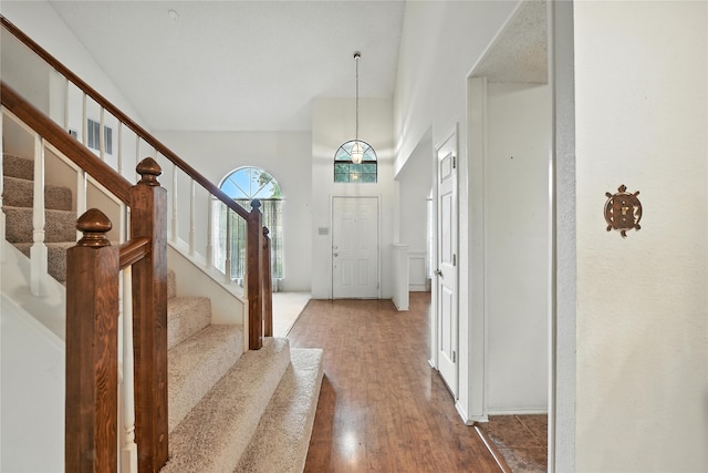 2116 S Winding Creek Dr, Grapevine, TX 76051 - foyer entrance with wood finished floors and stairs