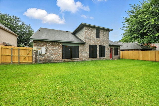 2116 S Winding Creek Dr, Grapevine, TX 76051 - rear view of house with brick siding, a fenced backyard, and a shingled roof