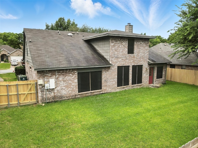 2116 S Winding Creek Dr, Grapevine, TX 76051 - back of house featuring a chimney, a fenced backyard, brick siding, roof with shingles, and a gate