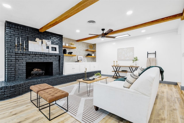 612 Circleview Dr S, Hurst, TX 76054 - living area with beamed ceiling, ceiling fan, recessed lighting, light wood-style flooring, and a fireplace