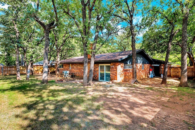 612 Circleview Dr S, Hurst, TX 76054 - rear view of property with a fenced backyard and brick siding