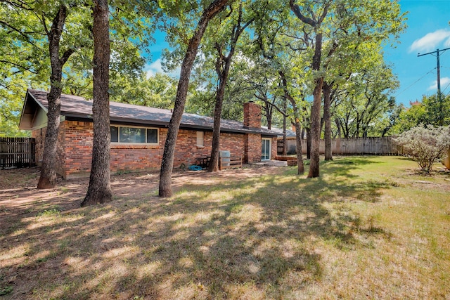 612 Circleview Dr S, Hurst, TX 76054 - rear view of property with a chimney and brick siding