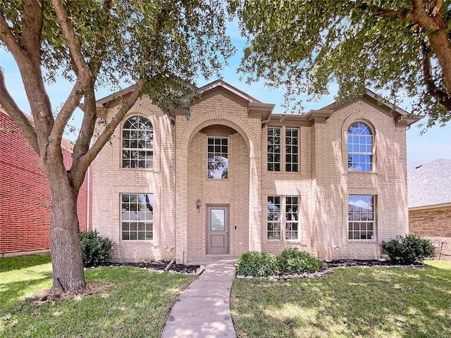 1207 Whitecreek Dr, Glenn Heights, TX 75154 - traditional-style home featuring brick siding and a front lawn
