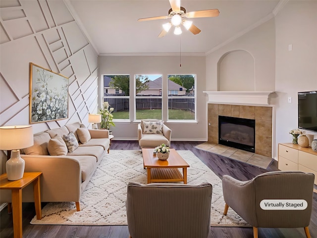 1207 Whitecreek Dr, Glenn Heights, TX 75154 - living room featuring crown molding, ceiling fan, wood finished floors, a fireplace, and lofted ceiling