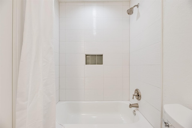 552 Kirkland Dr, Coppell, TX 75019 - bathroom featuring shower / tub combo with curtain