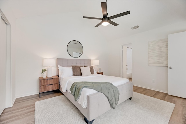 552 Kirkland Dr, Coppell, TX 75019 - bedroom featuring light wood finished floors, lofted ceiling, ensuite bathroom, and a ceiling fan