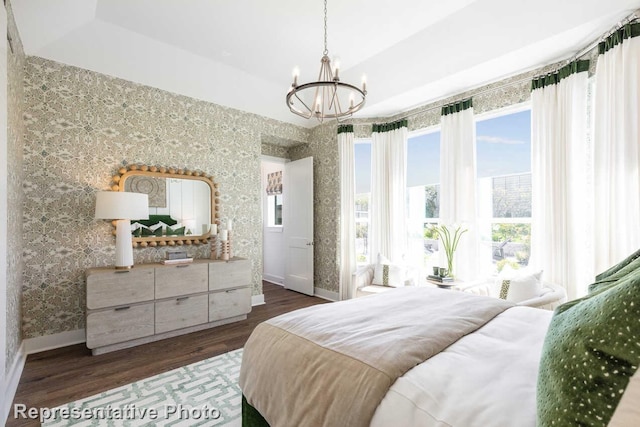 3617 Barrel Ln, Aubrey, TX 76227 - bedroom with a chandelier, dark wood-style floors, and wallpapered walls
