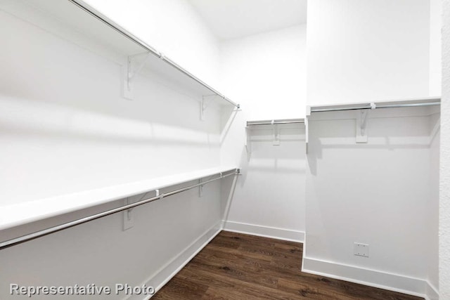 3617 Barrel Ln, Aubrey, TX 76227 - walk in closet featuring dark wood finished floors