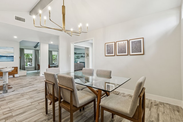 6010 Preston Creek Dr, Dallas, TX 75240 - dining area featuring a chandelier and light wood finished floors