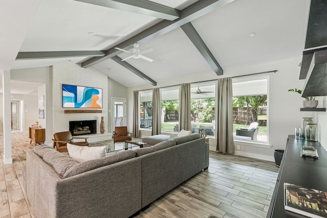 6010 Preston Creek Dr, Dallas, TX 75240 - living area featuring a ceiling fan, a fireplace, and light wood-style floors