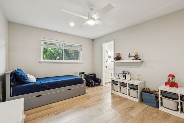 6010 Preston Creek Dr, Dallas, TX 75240 - bedroom featuring light wood finished floors, ensuite bath, and a ceiling fan