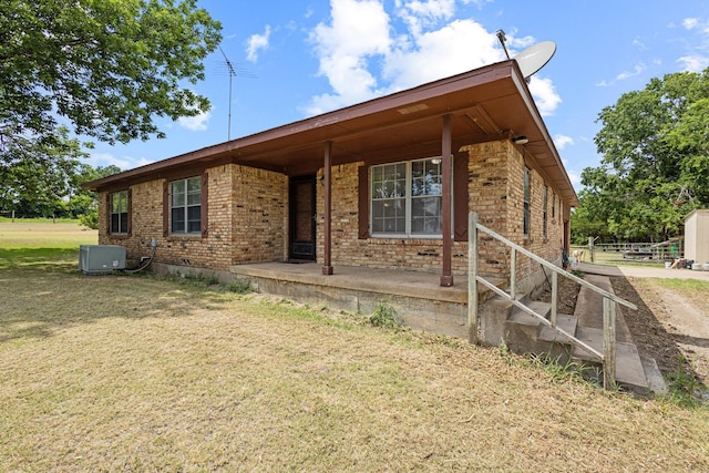 567 Celtic Rd, Howe, TX 75459 - single story home with brick siding, a front lawn, and a porch