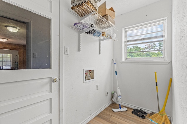 567 Celtic Rd, Howe, TX 75459 - laundry room featuring wood finished floors and washer hookup