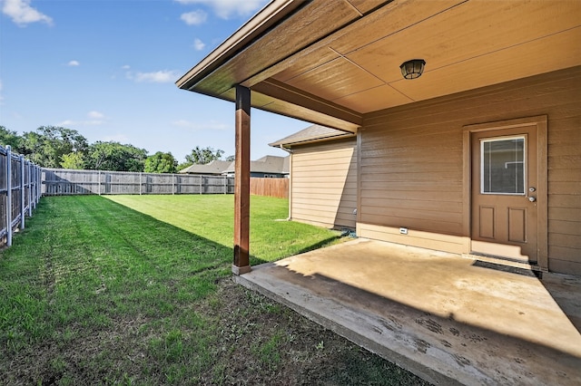 515 W Broad St, Pilot Point, TX 76258 - fenced backyard with a patio