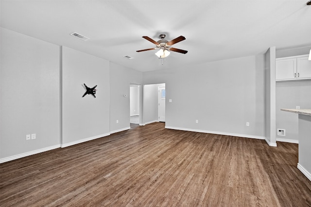 515 W Broad St, Pilot Point, TX 76258 - unfurnished living room with ceiling fan and wood finished floors