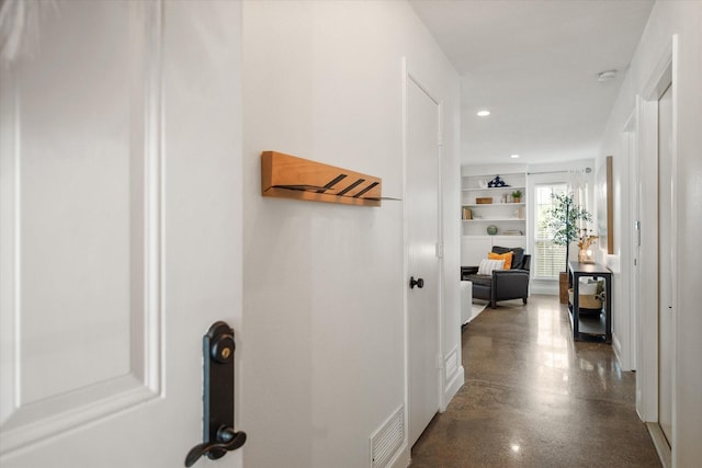 3302 Mckamy Oaks Trl, Arlington, TX 76017 - hallway with recessed lighting and concrete floors