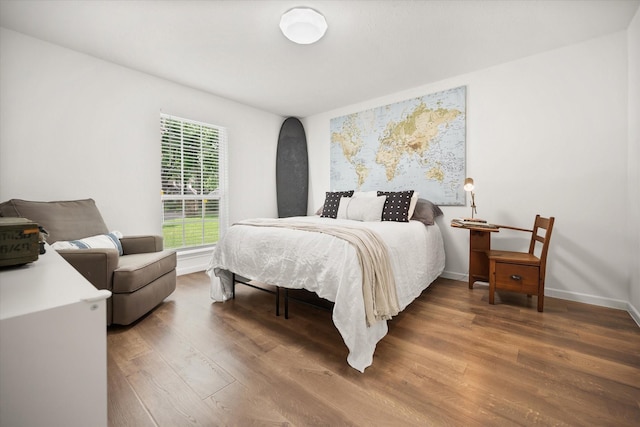 3302 Mckamy Oaks Trl, Arlington, TX 76017 - bedroom with wood finished floors and baseboards
