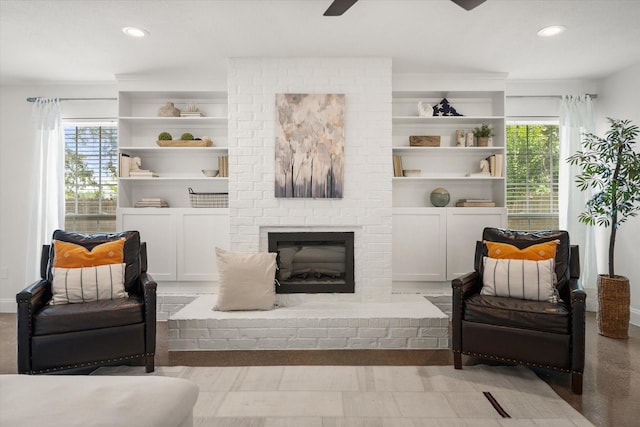 3302 Mckamy Oaks Trl, Arlington, TX 76017 - sitting room with recessed lighting, plenty of natural light, a ceiling fan, built in shelves, and a fireplace