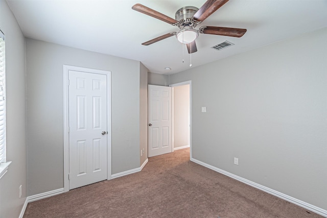 1900 Sumac Dr, Flower Mound, TX 75028 - unfurnished bedroom featuring carpet floors and a ceiling fan