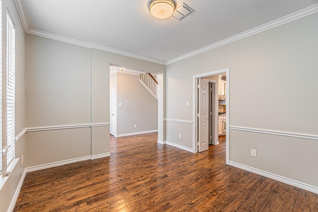 1900 Sumac Dr, Flower Mound, TX 75028 - unfurnished room featuring wood finished floors, crown molding, and stairs