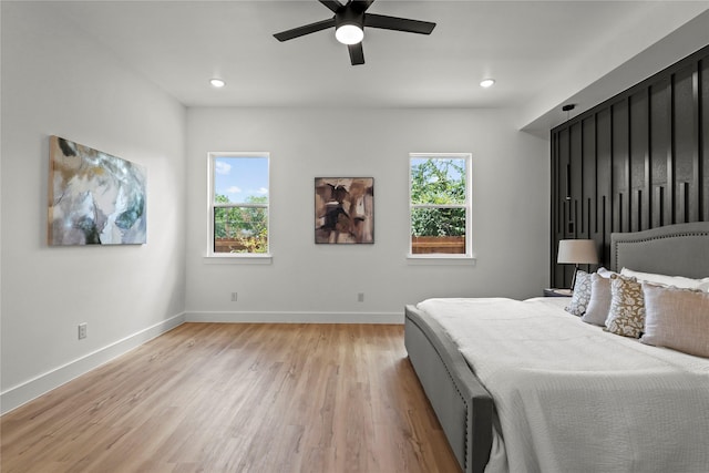 404 Cleaves St, Dallas, TX 75203 - bedroom with light wood finished floors, recessed lighting, and ceiling fan