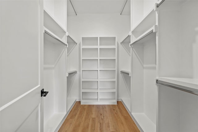 404 Cleaves St, Dallas, TX 75203 - spacious closet featuring light wood-type flooring