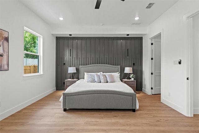 404 Cleaves St, Dallas, TX 75203 - bedroom featuring light wood-style flooring, recessed lighting, and ceiling fan