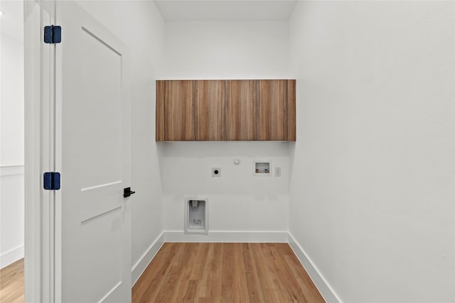 404 Cleaves St, Dallas, TX 75203 - laundry room featuring electric dryer hookup, light wood-style floors, washer hookup, and hookup for a gas dryer