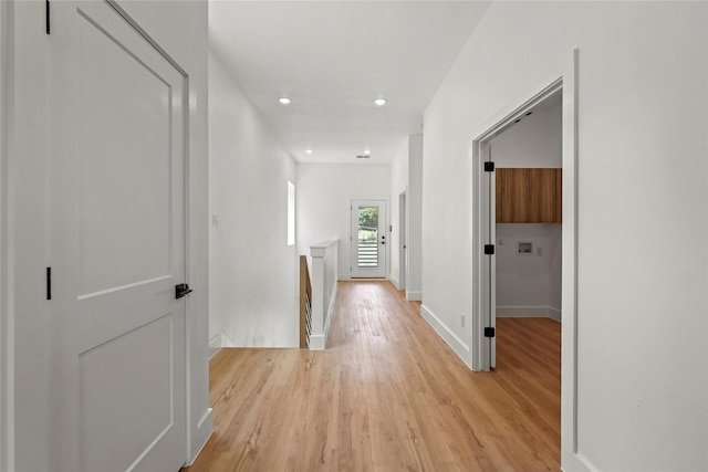 404 Cleaves St, Dallas, TX 75203 - hall with light wood-type flooring, an upstairs landing, and recessed lighting