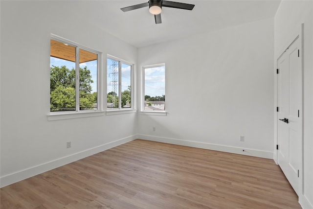 404 Cleaves St, Dallas, TX 75203 - unfurnished bedroom featuring light wood-style floors and a ceiling fan