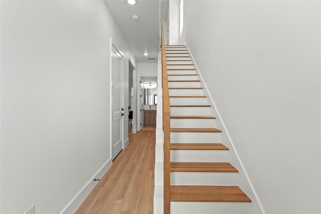 404 Cleaves St, Dallas, TX 75203 - staircase with recessed lighting and wood finished floors