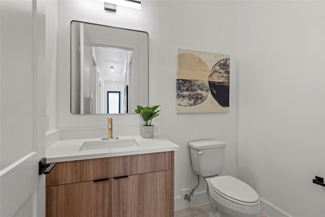 404 Cleaves St, Dallas, TX 75203 - bathroom featuring vanity and toilet